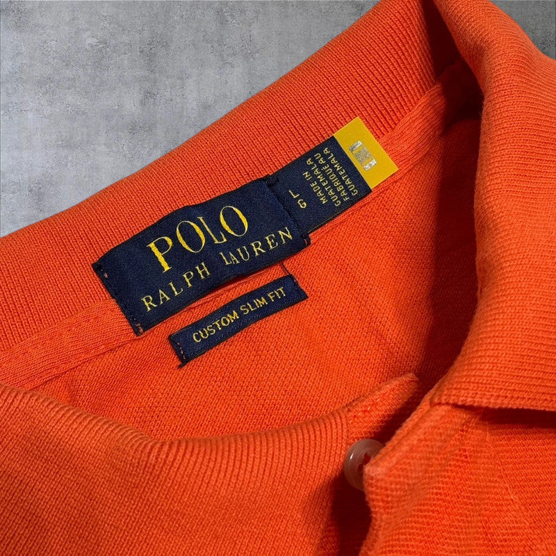 Ralph Lauren Polo (L)